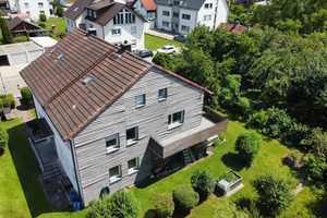Großzügiges Zweifamilienhaus mit Traumgarten in begehrter Lage von Gerlenhofen