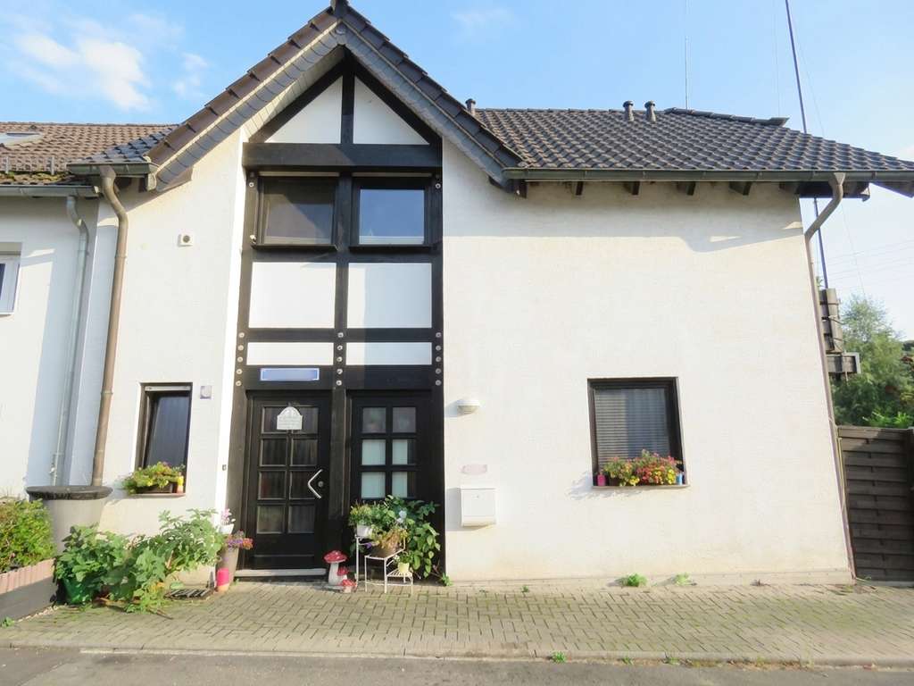 Immobilie in Much - Much: Charmantes Einfamilienhaus mit Terrasse für clevere Kapitalanleger - Bild 1