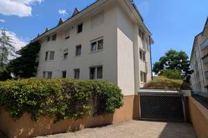 Charmante 2-Zimmer-Wohnung mit Gartenanteil, Einbauküche und Tiefgaragenstellplatz