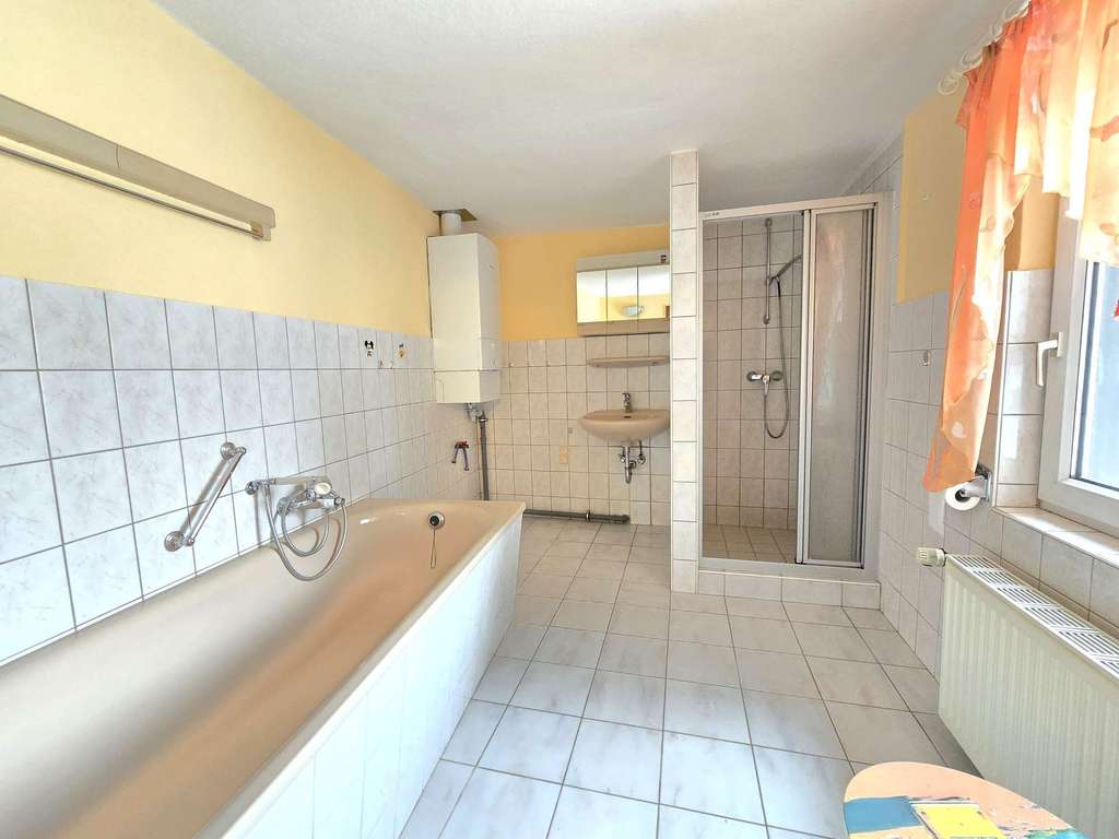 Immobilie in Barby - Charmantes Reihenmittelhaus mit Garage und Garten in ruhiger Lage von Barby - Bild 4