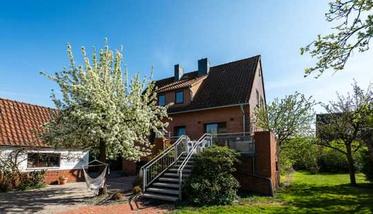 Bild von Familienfreundliches Einfamilienhaus mit großem Grundstück und Mehrzweckhalle in Garbsen