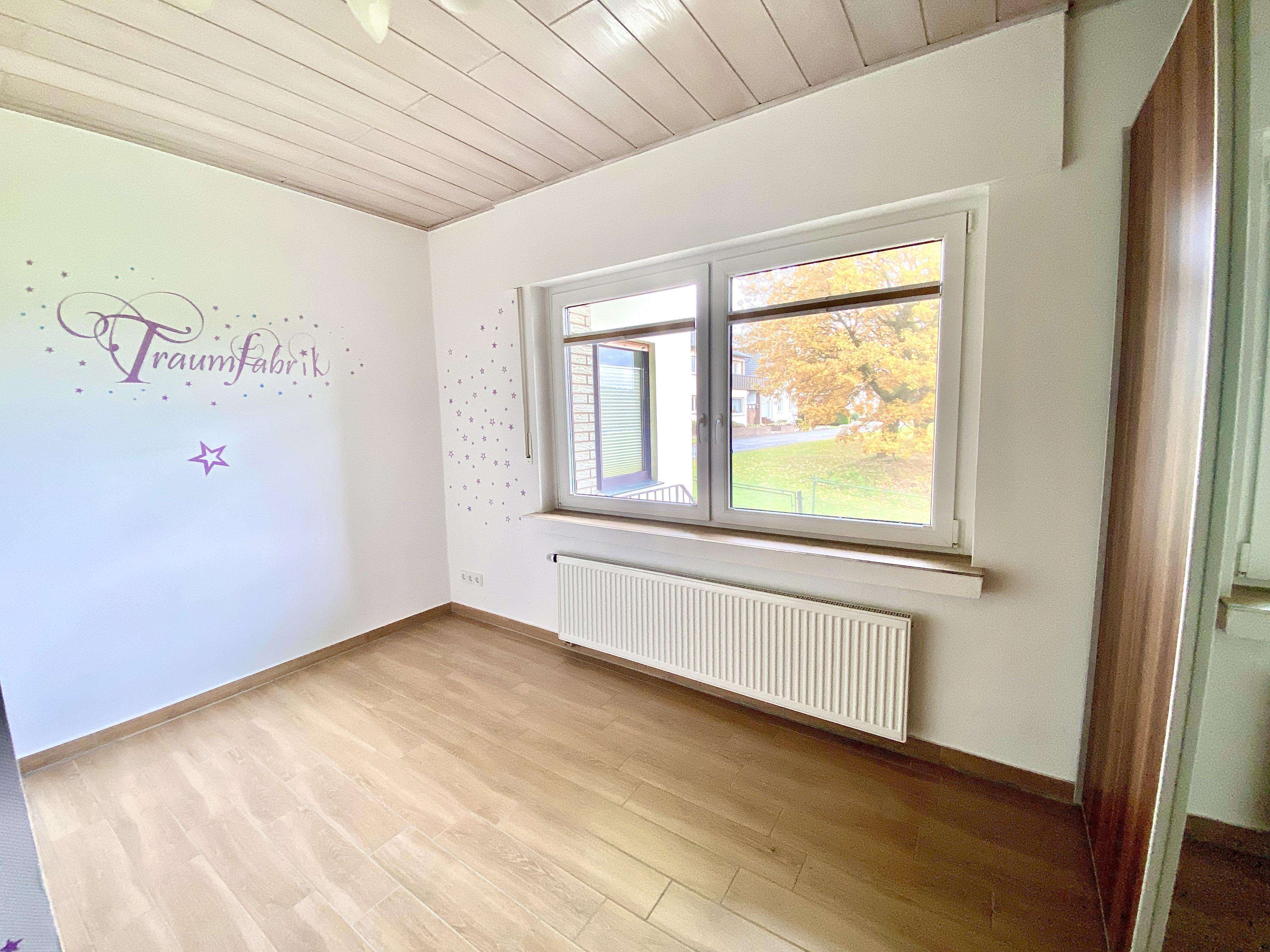 Immobilie in Preußisch Oldendorf - Generationenwohnen mitten im Grünen! - Bild 1