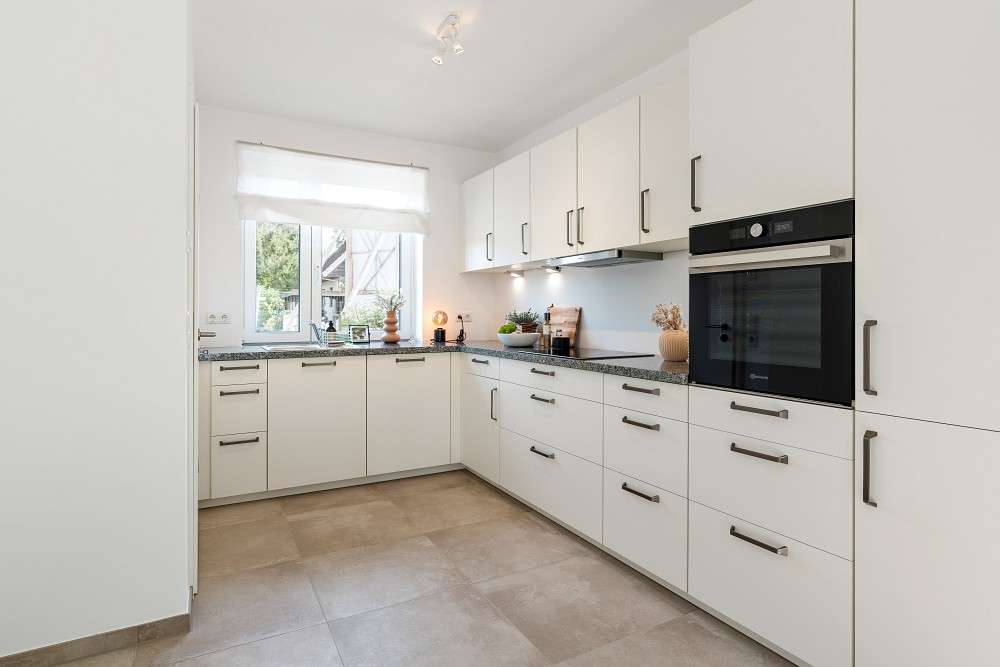 Immobilie in Hoisdorf - Kapitalanlage: Moderne Doppelhaushälfte mit gehobener Ausstattung in familienfreundlicher Wohnlage - Bild 1