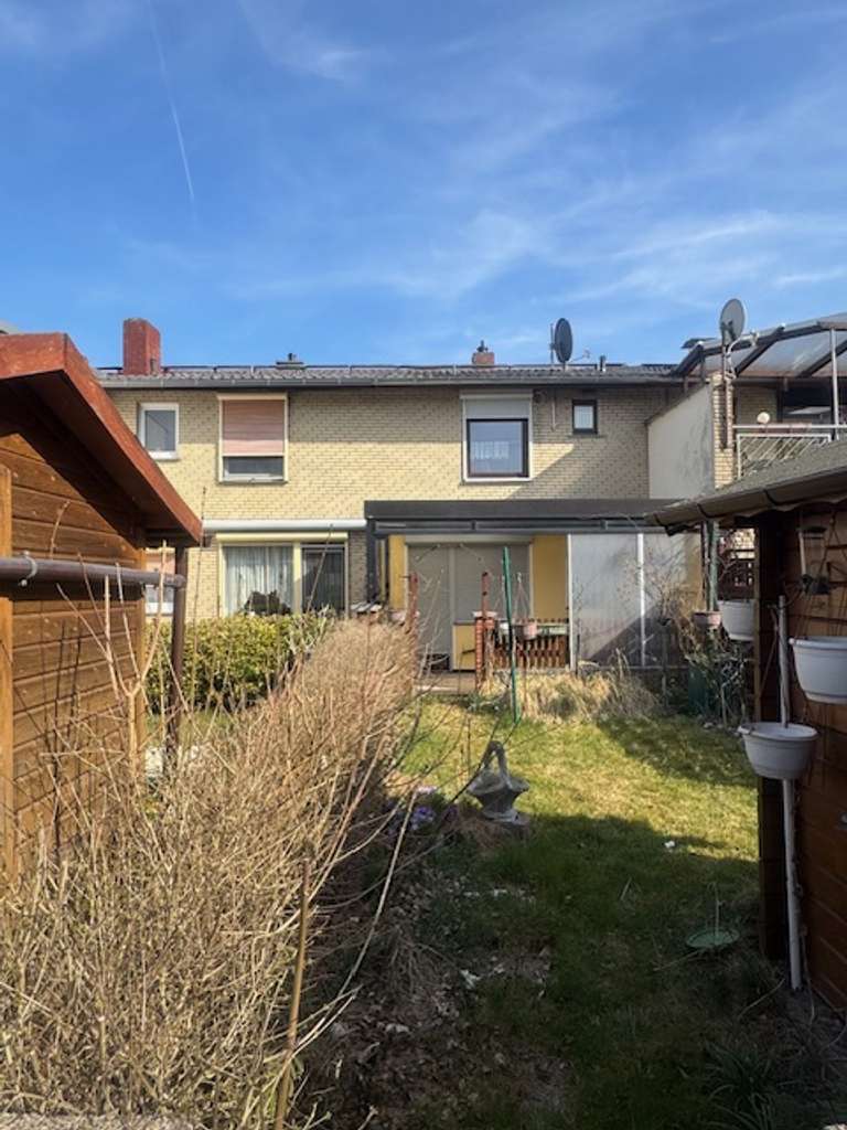 Bezugsfreies Reihenmittelhaus mit pflegeleichtem Garten  für die kleine Familie