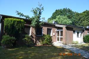 Großzügiger Bungalow mit Wintergarten und Kamin als Reihenmittelhaus in Münster-Angemodde