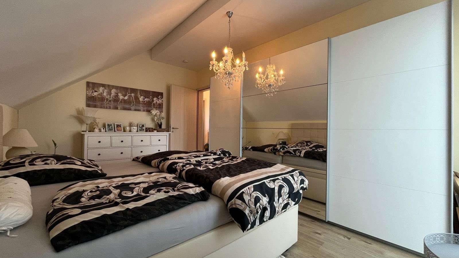 Immobilie in Dolgesheim - Einziehen & Wohlfühlen: Hochwertiges Wohnen auf zwei Etagen - Bild 2