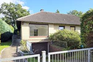 Einfamilienhaus mit wunderschönen Garten 