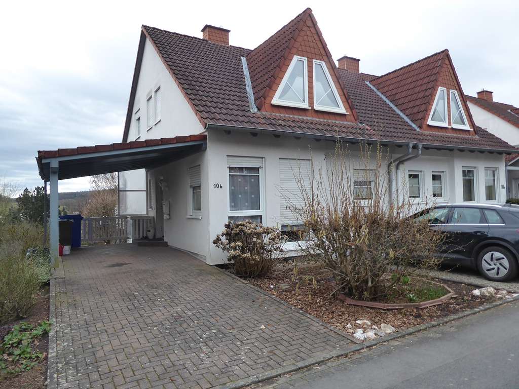Immobilie in Mömbris - 1 Fam. Wohnhaus (DHH) mit Carport in wunderschöner Südhanglage - Bild 0