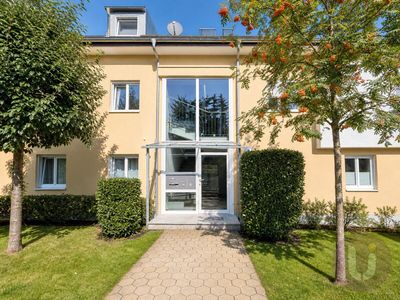 Lichtdurchflutete Wohnung mit großer, sonniger Terrasse und Garten