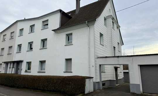 Dreifamilien-/Reihenendhaus in guter und grüner Wohnlage