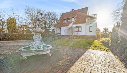 Bild von Liebevoll modernisiertes Einfamilienhaus mit Baulücke und hochwertiger Großgarage!