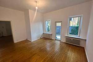 Unkonventionelle 2-R. Studiowohnung im Erdgeschoss mit Terrasse/Hof