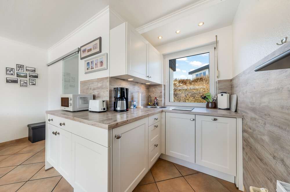 Immobilie in Hörnum (Sylt) - Helle Erdgeschosswohnung direkt am Strand mit Balkon - Bild 2