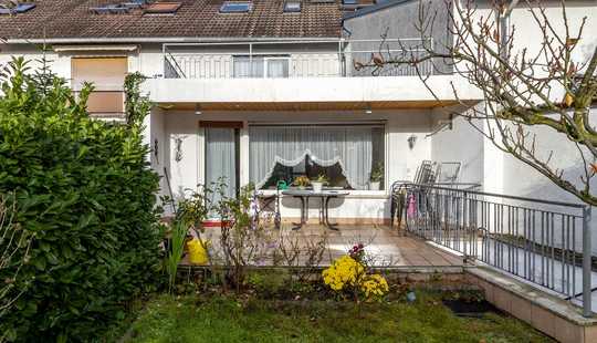 Bild von Reihenmittelhaus in der Darmstädter Heimstättensiedlung mit Garten und Garage