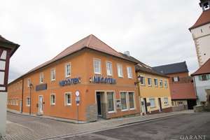 Wohn- und Geschäftshaus inmitten einer liebenswerten Kleinstadt – Die vollständige Adresse der Immobilie erhältst du vom Anbieter., 97215 Uffenheim – Vorschaubild 1