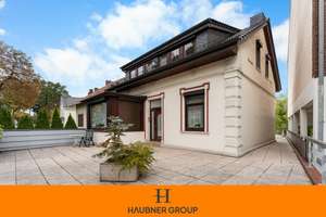 NAHE DIAKO! 1-Familien-Haus mit 25! Garagen, großer Dachterrasse und Keller