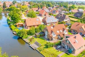 Genehmigte Ferienwohnung in direkter Wasserlage – Die vollständige Adresse der Immobilie erhältst du vom Anbieter., 26736 Krummhörn – Vorschaubild 1