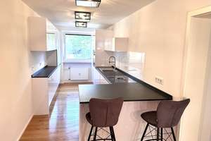 Exklusive 3-Zimmer-Wohnung mit 76 m², 2 Balkonen, hochwertiger Einbauküche & Stellplatz