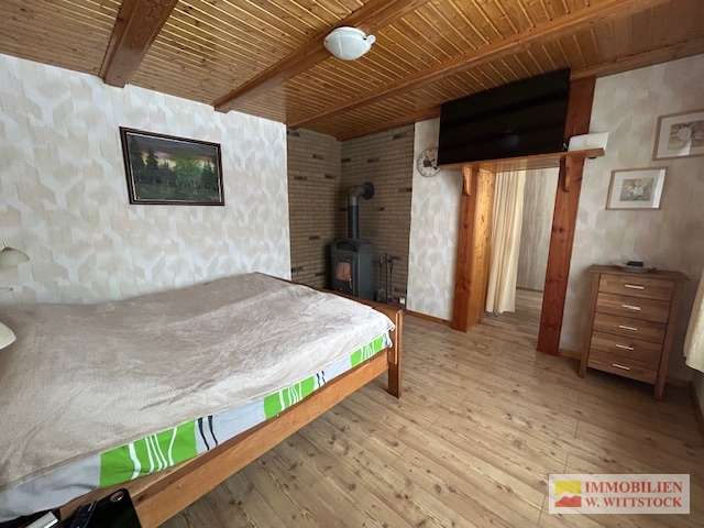 Immobilie in Putlitz - Gepflegtes Grundstück mit gemütlichen EFH, Carport, Werkstatt und Partyraum in ruhiger Dorflage - Bild 0