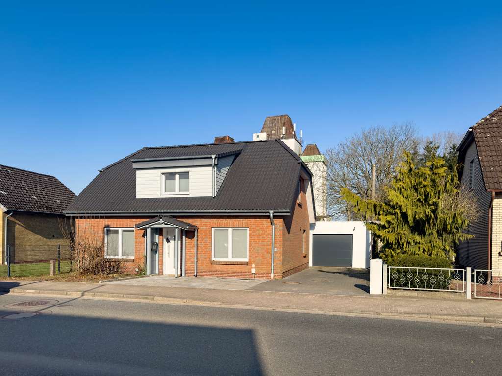 Immobilie in Bollingstedt - Einfamilienhaus mit Garten in zentraler Lage in Jübek - Bild 1