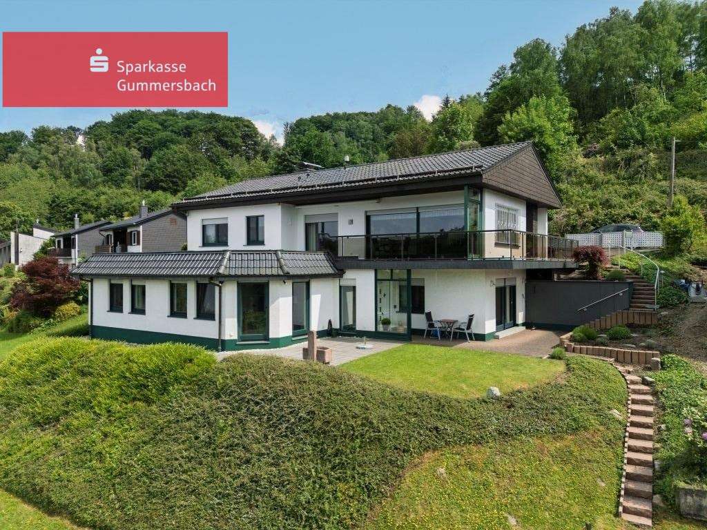 Einzigartiges Einfamilienhaus mit Einliegerwohnung und atemberaubendem Seeblick!