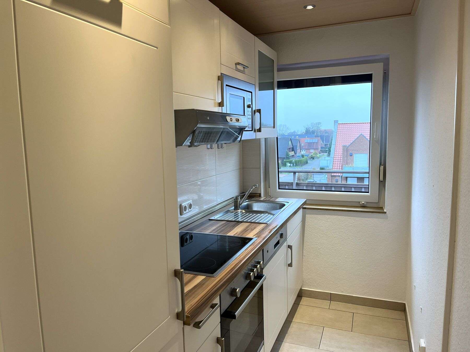 Immobilie in Dornum - Dachgeschosswohnung mit Inselblick - Bild 1