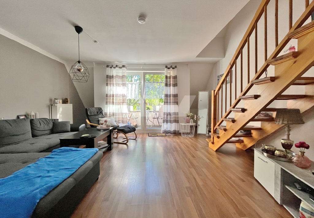 Immobilie in Großheide - Oberwohnung mit Balkon in Großheide, direkt am Marktplatz! - Bild 1