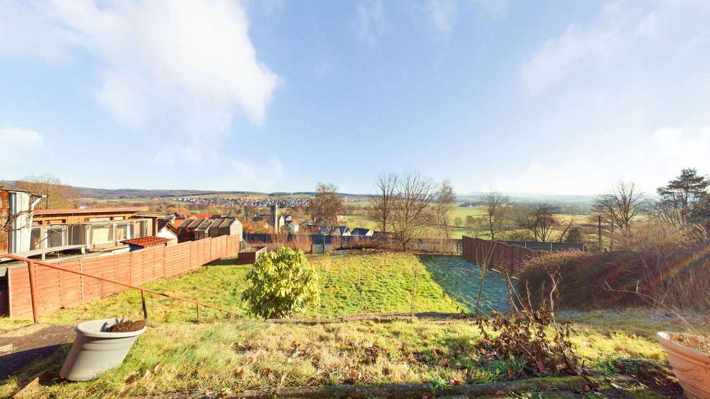 Immobilie in Petersberg - Vielseitige Doppelhaushälfte mit zwei Wohneinheiten, großem Grundstück in Petersberg OT Steinau - Bild 0