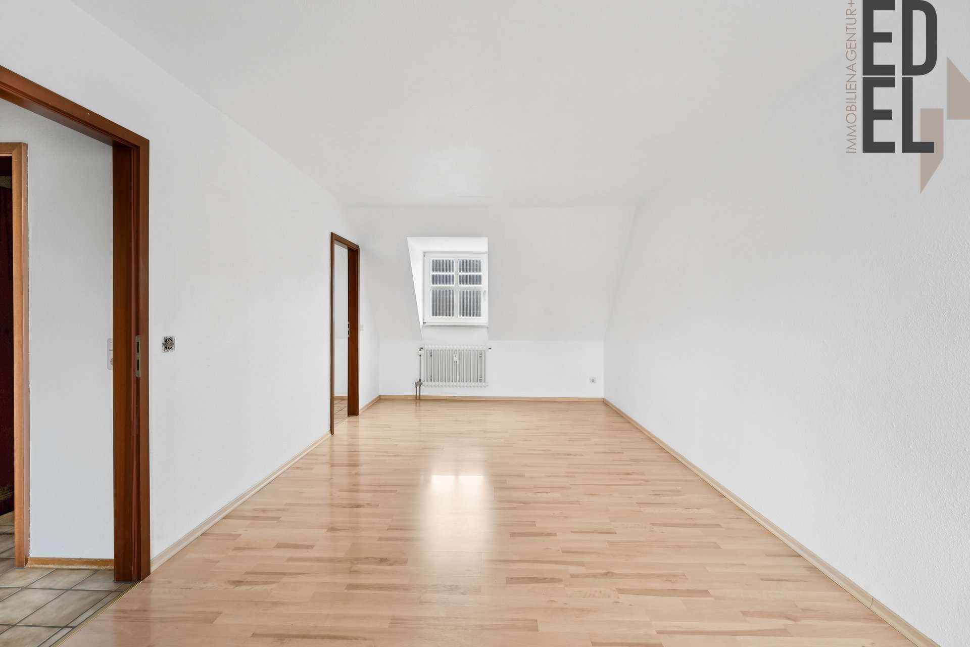 Immobilie in Neutraubling - 3-Zimmer-Maisonette mit Balkon & Stellplätzen in ruhiger Lage von Neutraubling - Bild 3