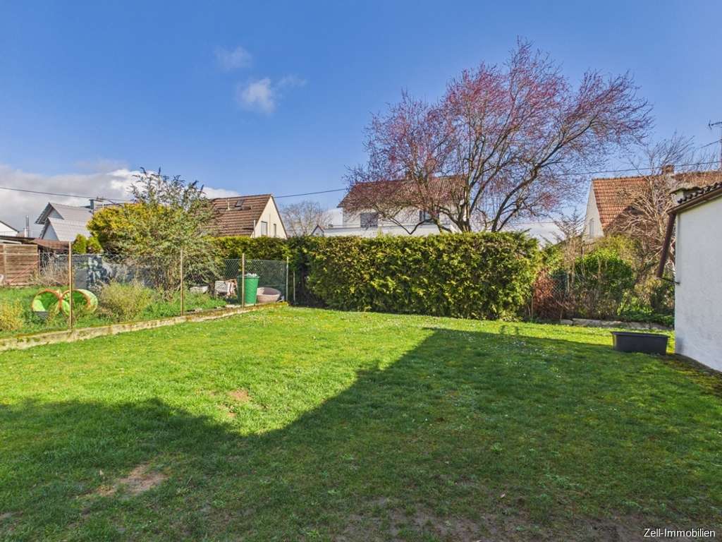 Immobilie in Geisenheim - Doppelhaushälfte zum Wohlfühlen mit schönem Garten in beliebter Wohnlage - Bild 2