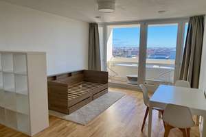 Helles 1-Zimmer-Appartement mit Balkon im 12. OG im Olympiadorf – Die vollständige Adresse der Immobilie erhältst du vom Anbieter., 80809 Am Riesenfeld, München – Vorschaubild 1
