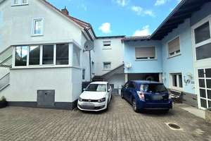 2 Häuser auf einem Grundstück mit Garten in Münster