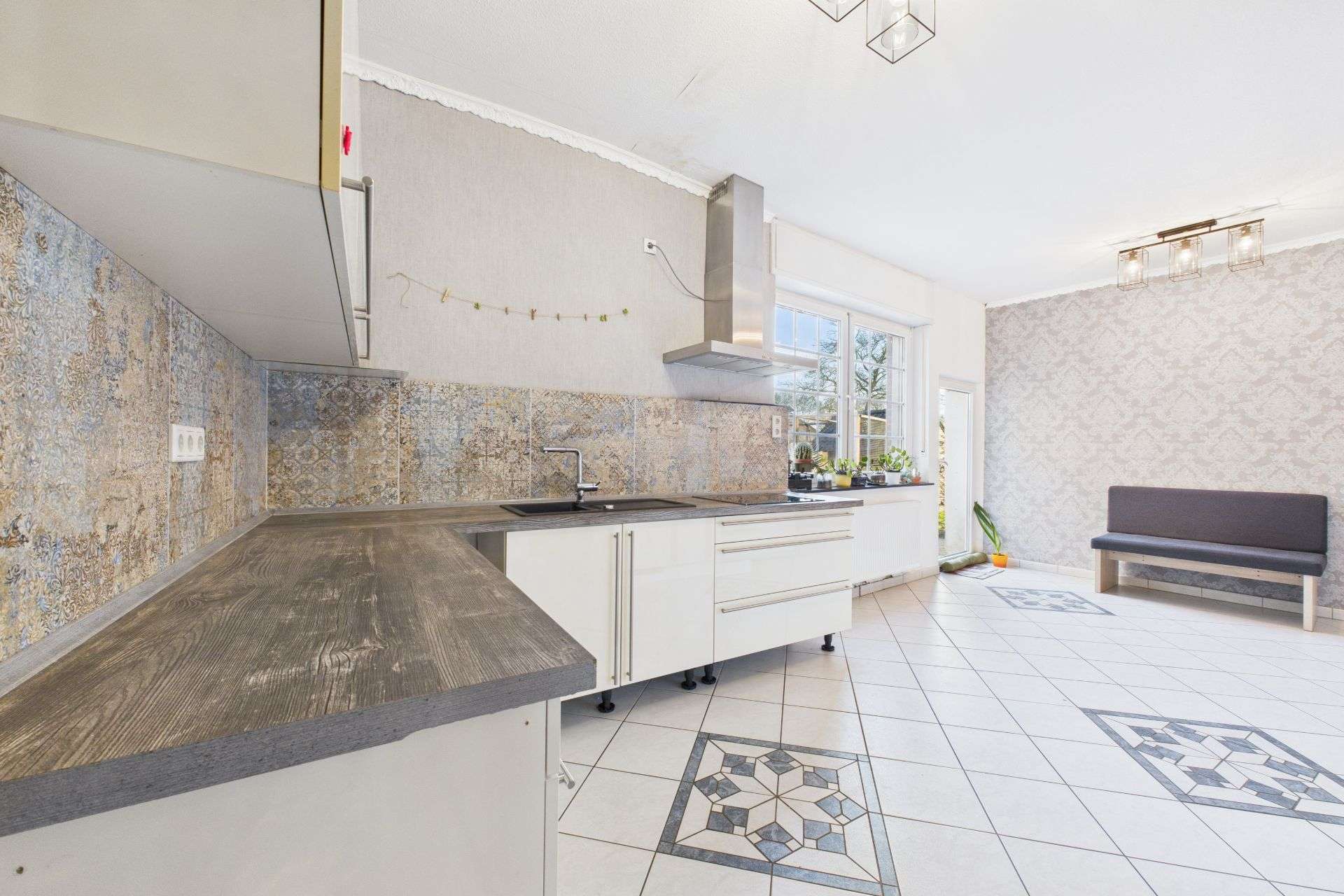 Immobilie in Telgte - Großzügig wohnen: stilvolle Wohnung mit großem Garten & beheiztem Wintergarten! - Bild 2