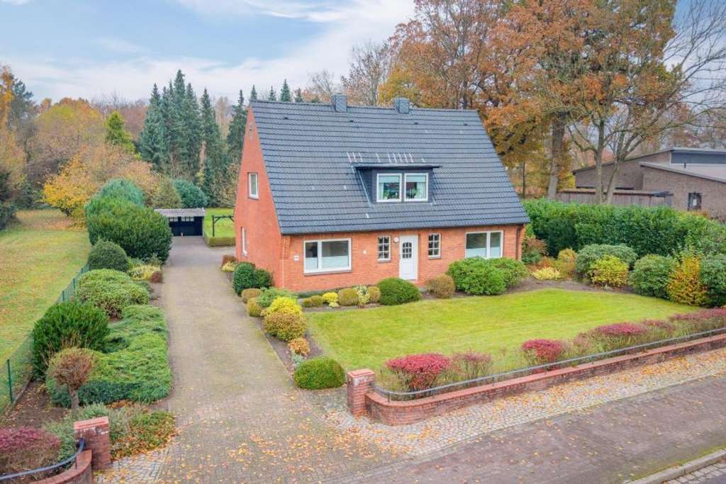 Immobilie in Fockbek - Provisionsfrei* Großzügiges familienfreundliches Zweifamilienhaus mit großem Garten in zentraler Lag - Bild 0