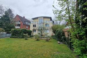 Stilvolles Wohnen: Moderne, helle Erdgeschoß-Eigentumswohnung mit Terrasse & Garten