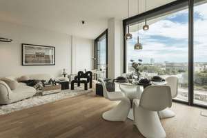 Urban wohnen mit Alpenblick – Stilvolles Design-Apartment mit Dachterrasse & Concierge-Service