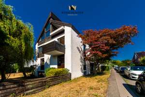 Wohnen, Arbeiten, Investieren: Dreifamilienhaus mit Atelier, Gartenidylle & Charme