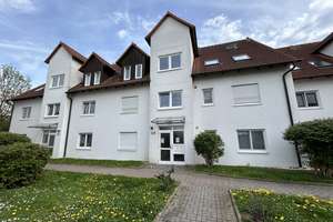 Vermietete 2-Zimmer-Eigentumswohnung mit Terrasse und Tiefgaragenstellplatz