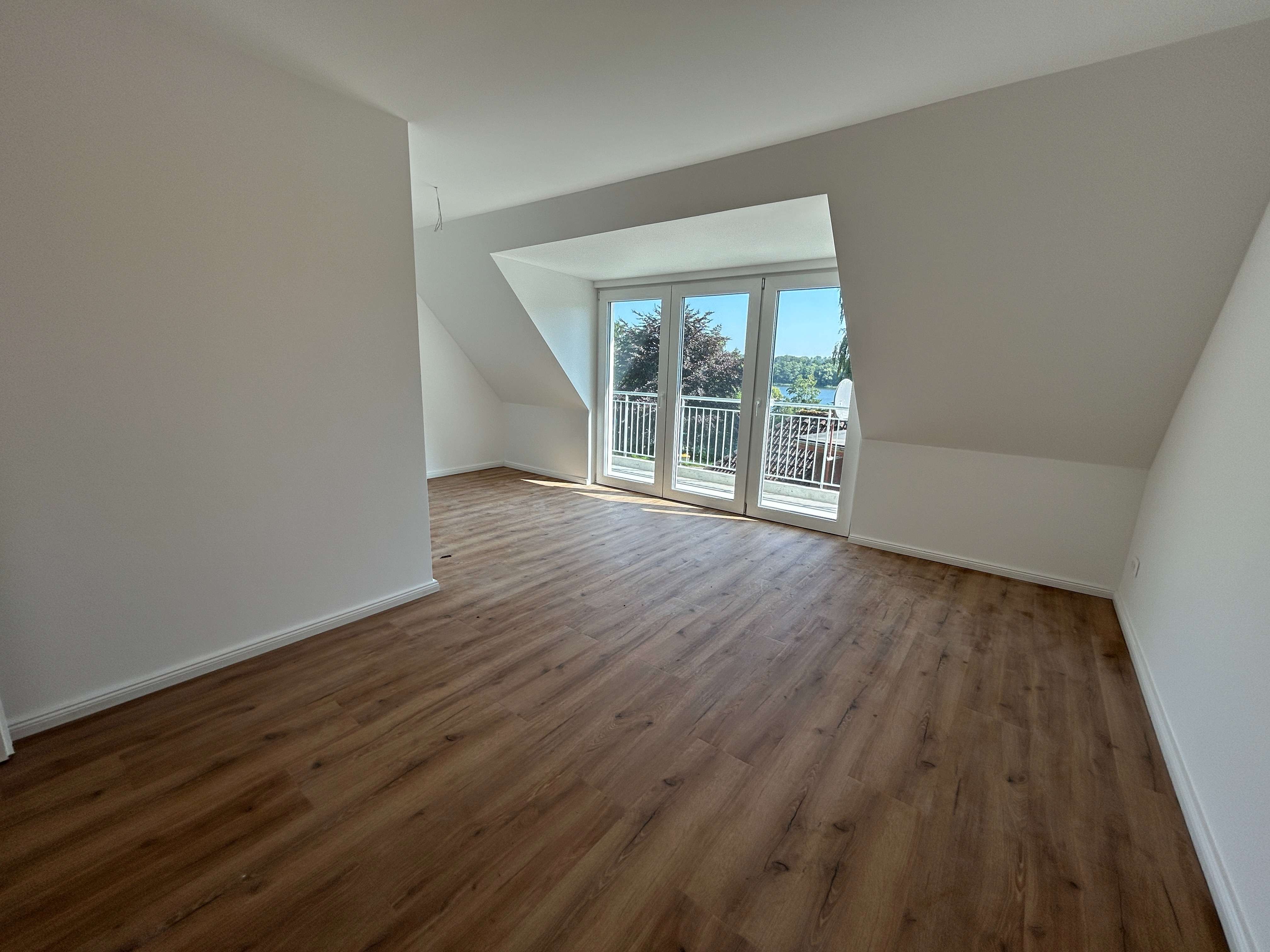 Immobilie in Rohlstorf - Modern wohnen am See – Stilvolle Neubau-Townhäuser in traumhafter Lage - Bild 1