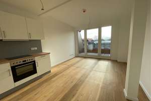 Helle 2-Zimmer Neubau-Dachgeschosswohnung mit Balkon