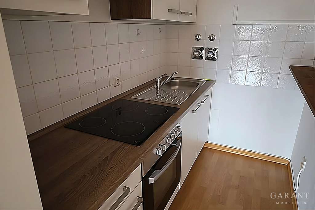 Immobilie in Kirchheim bei München - Kapitalanlage oder Selbstnutzung: Helle Balkonwohnung am Ortspark Kirchheim - Bild 1