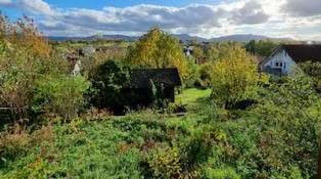 Immobilie in Holzmaden - Charmantes Einfamilienhaus mit traumhafter Aussicht und bebaubarem Garten. - Bild 3