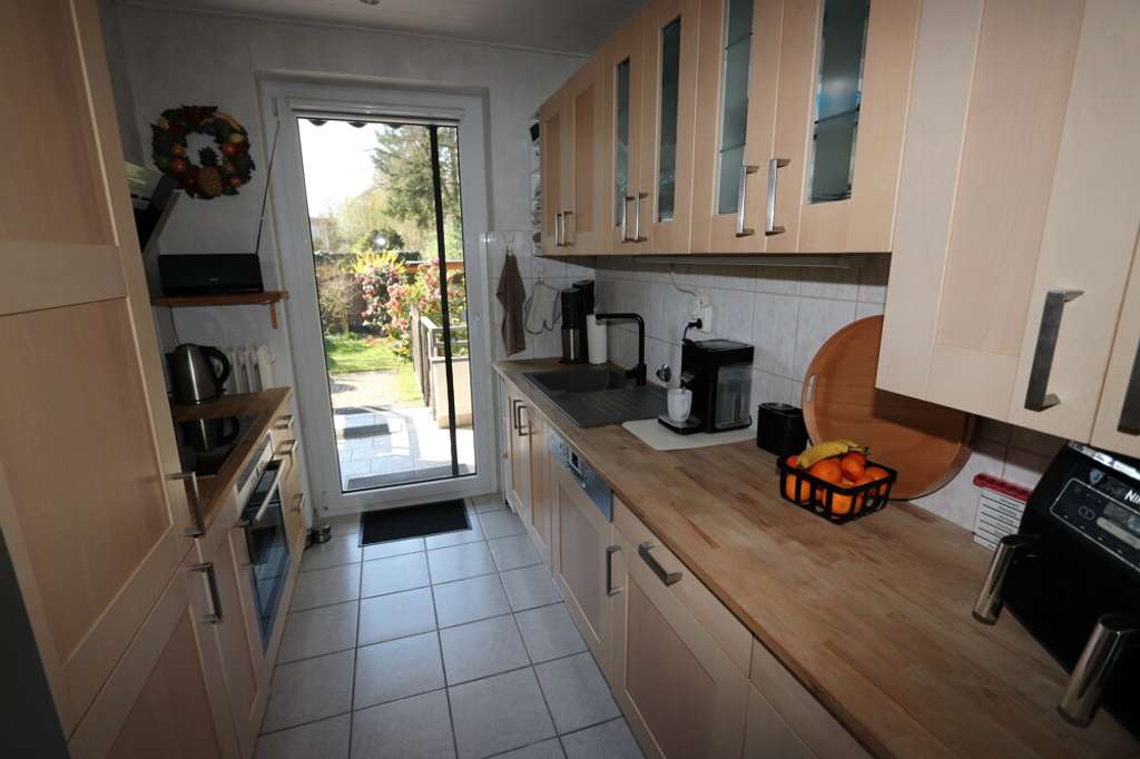 Immobilie in Kaarst - + Kaarst + vermietetes 6-Parteien-Haus + Baujahr 1968 + insgesamt ca. 312 m² Wohnfläche + Garage + - Bild 4