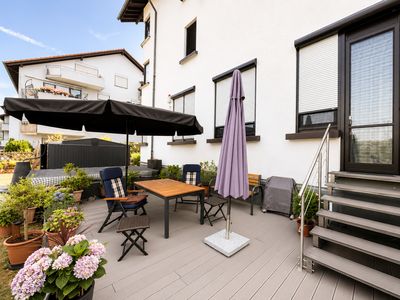 Wohnen, Arbeiten & Hobby vereint – Hochwertige Wohnung mit Garten & Studio!
