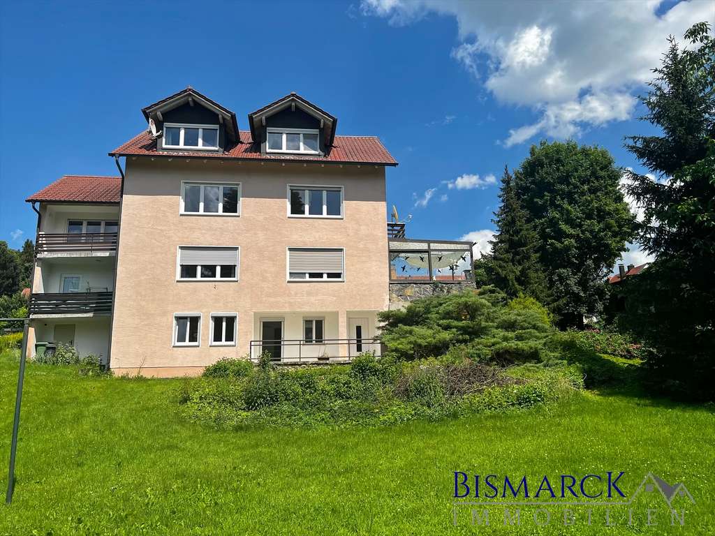 Immobilie in Neufahrn in Niederbayern - Attraktives Mehrfamilienhaus mit großem Baugrundstück - Bild 0