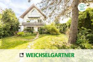 Eigentumswohnung mit herrlichem West-Garten, extra Hobbykeller und zwei Garagen