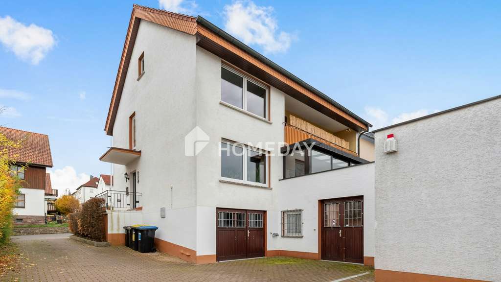 Immobilie in Fulda - Mehrfamilienhaus mit 3 Wohneinheiten, Terrasse, Wintergarten und Garten in attraktiver Lage - Bild 2