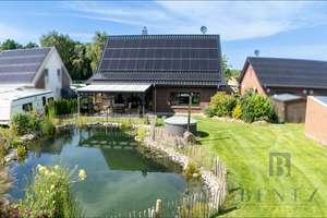 Neuwertiges Einfamilienhaus mit Schwimmteich - modernes Wohnen trifft Naturidylle – Die vollständige Adresse der Immobilie erhältst du vom Anbieter., 27639 Nordholz – Vorschaubild 1