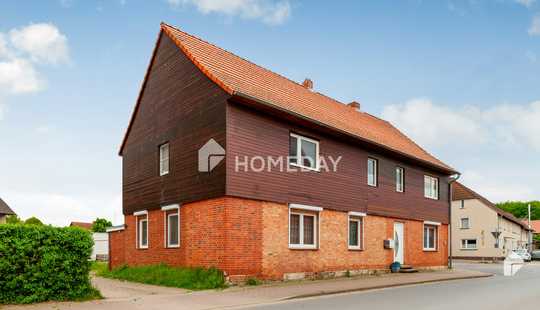 Bild von Charmantes Mehrfamilienhaus mit zwei Wohneinheiten, Garage, Carport und großzügigem Garten