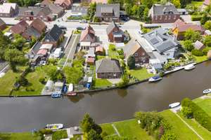 Ruhig und direkt am Wasser: renovierter 4-Zimmer-Bungalow in Loppersum, Hinte. Provisionsfrei! – Loppersumerstraße 24, 26759 Hinte – Vorschaubild 3